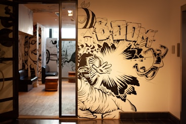 a hallway with a mural on the wall