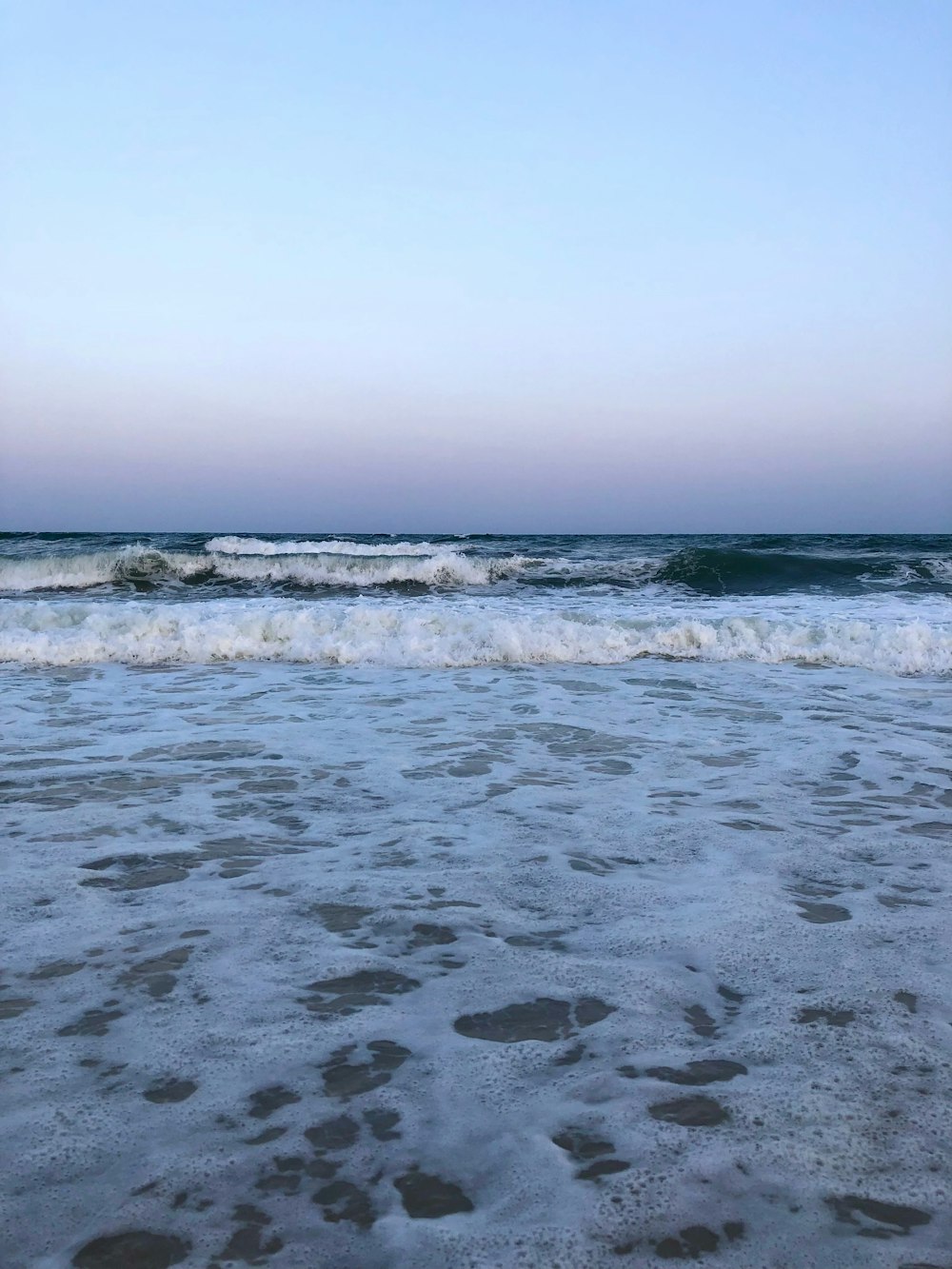 a beach next to the ocean