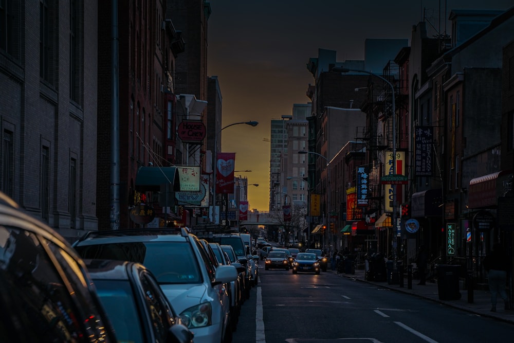 a view of a city street filled with lots of traffic