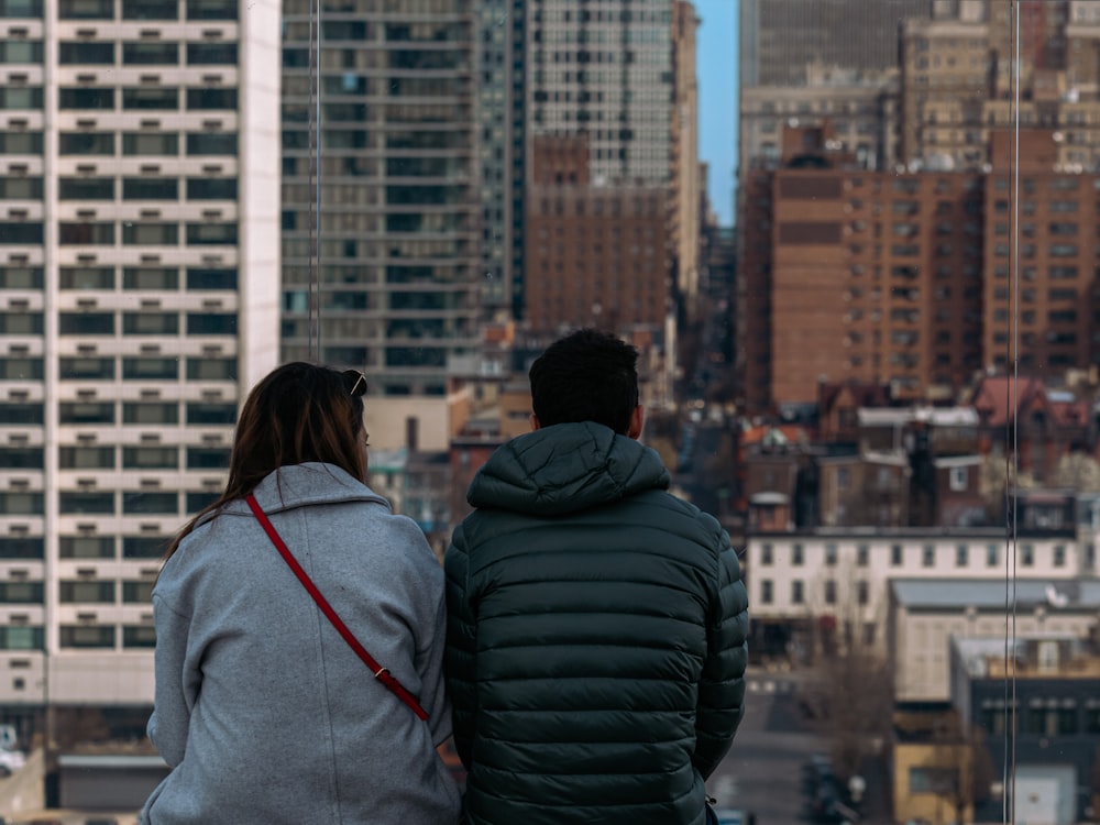 a group of people standing in front of a building