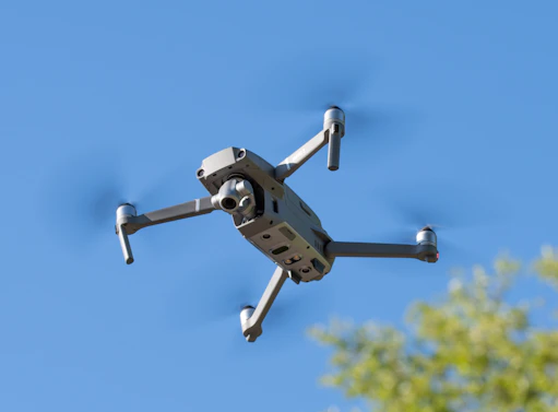 a close up of a camera attached to a flying object
