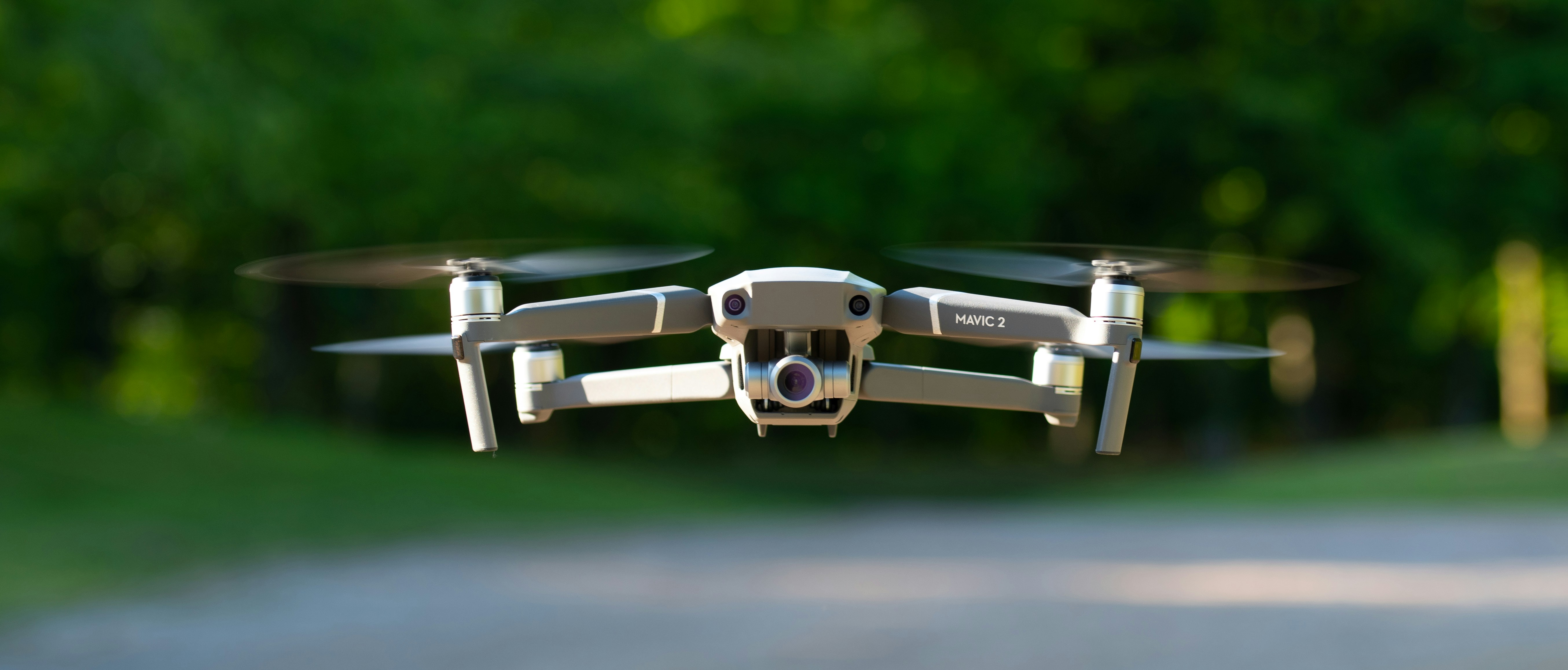 a close up of a small white flying object