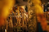A grand Indian wedding setup glowing with marigolds and fairy lights under a twilight sky
