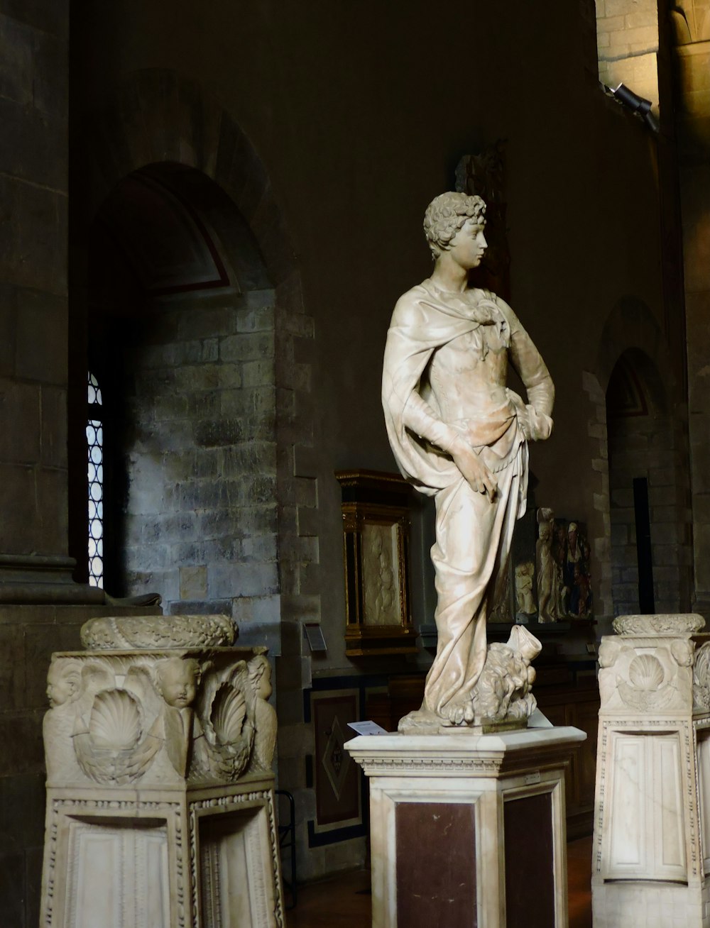 a statue of a woman in a church
