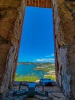 Aerial drone view capturing the wedding venue surrounded by the scenic Cádiz coastline.