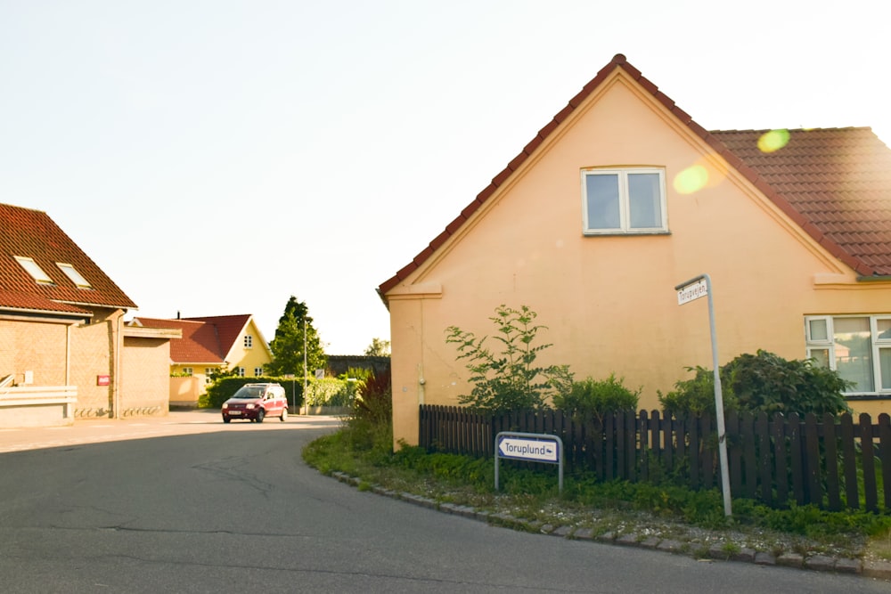 a car is parked in front of a house