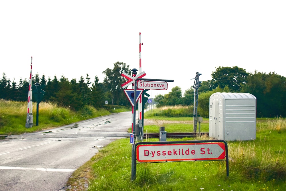 a street sign sitting on the side of a road