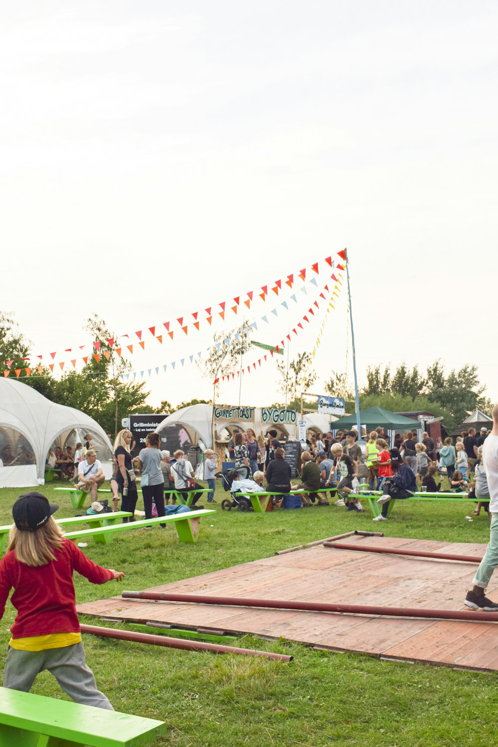 a group of people playing a game of frisbee