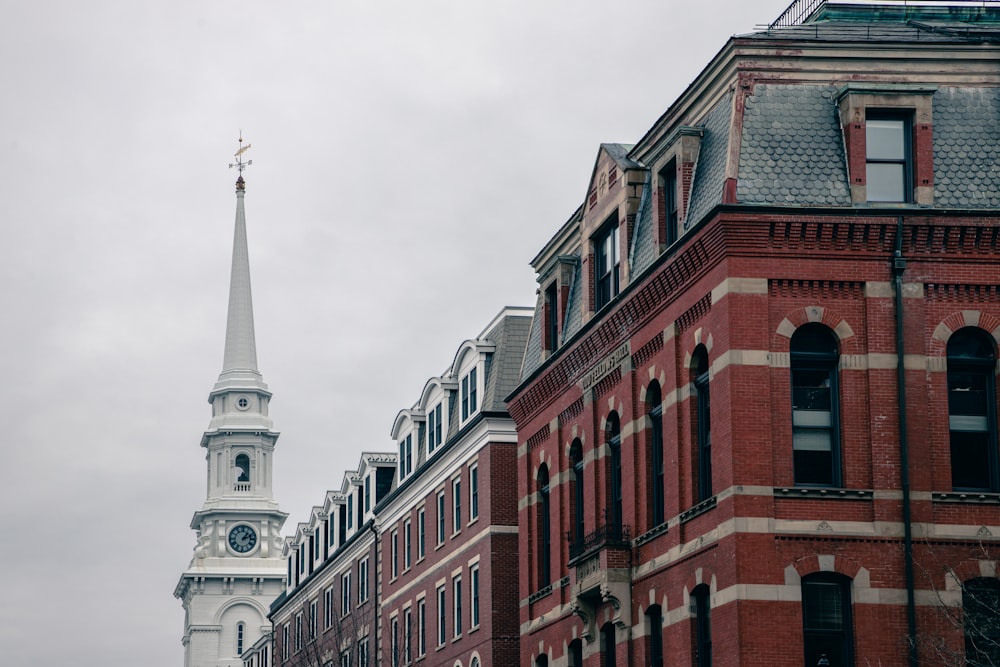 a tall building with a steeple in the background