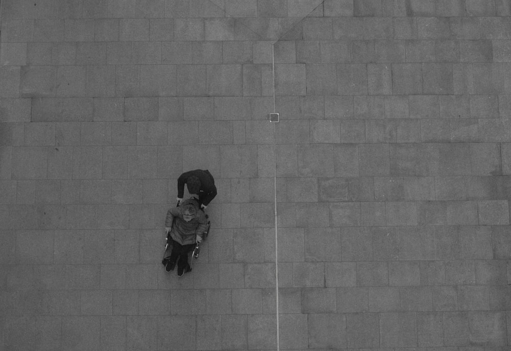 a person standing on the side of a building
