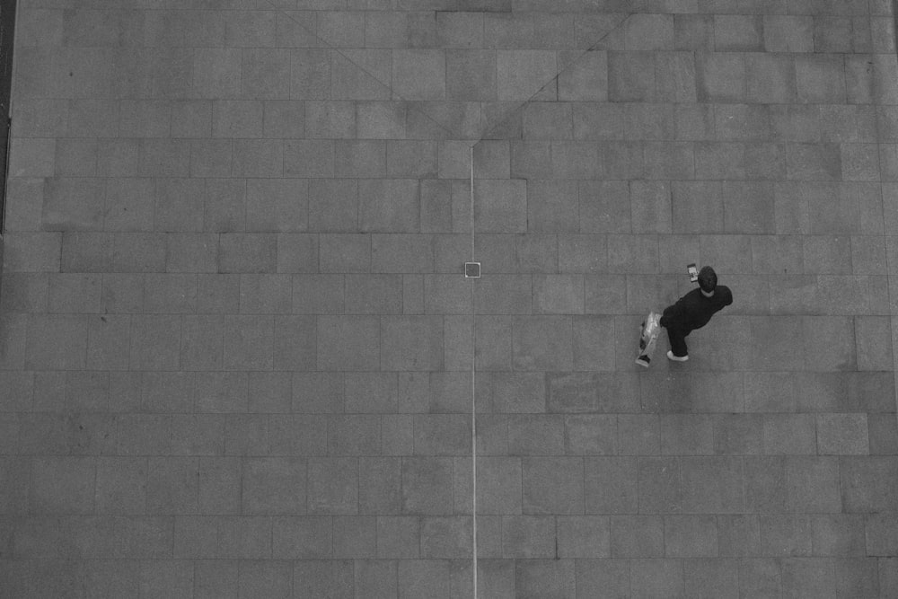 a man on a skateboard on the side of a building