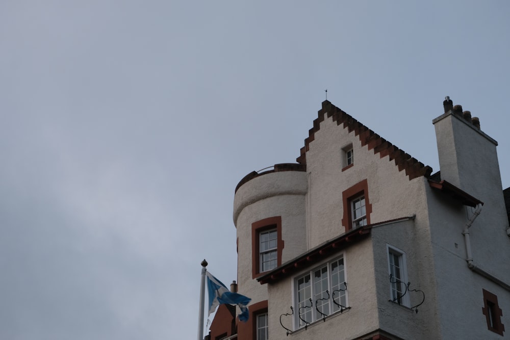 a tall building with a clock on the top of it