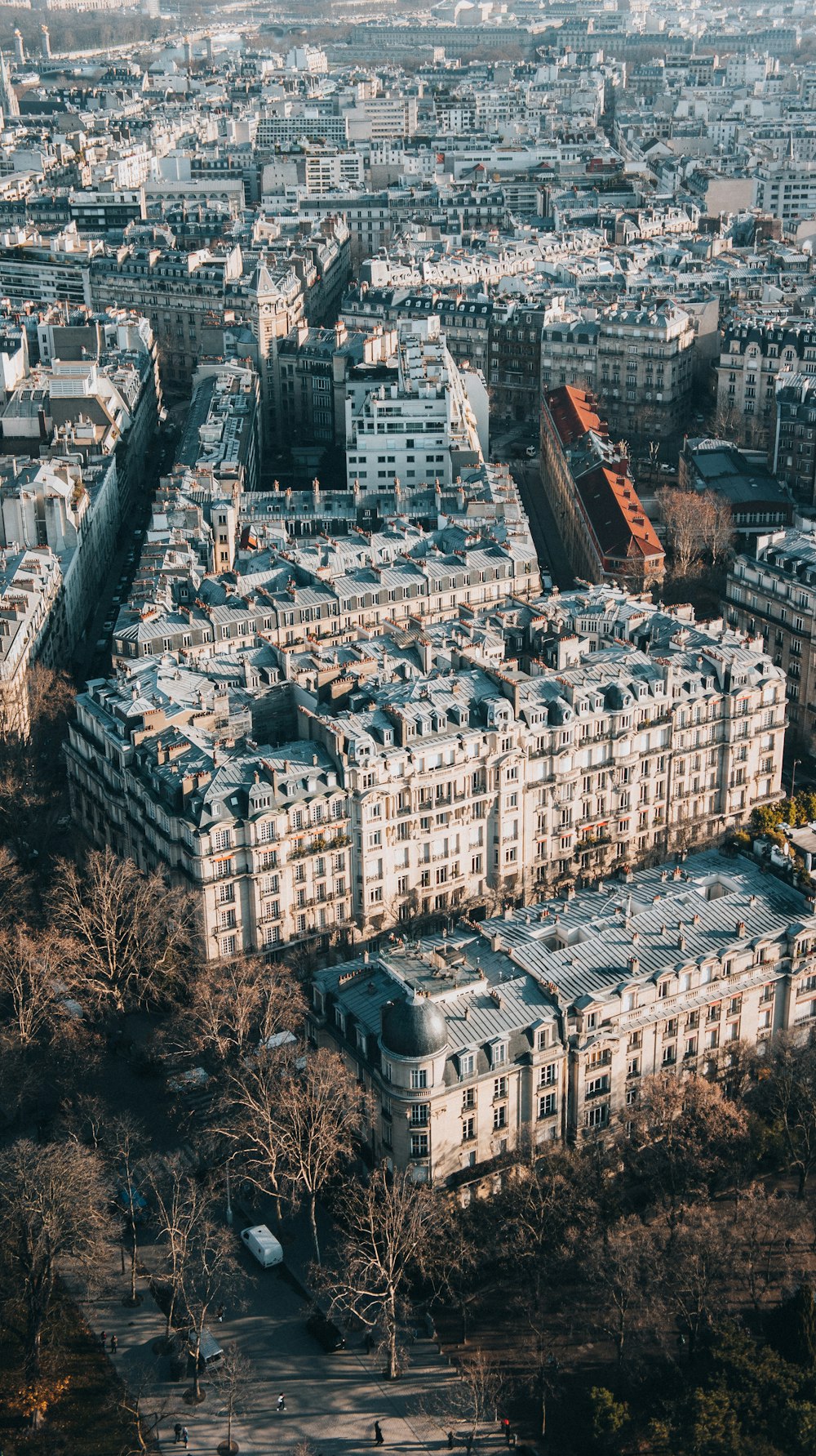 an aerial view of a large building in a city