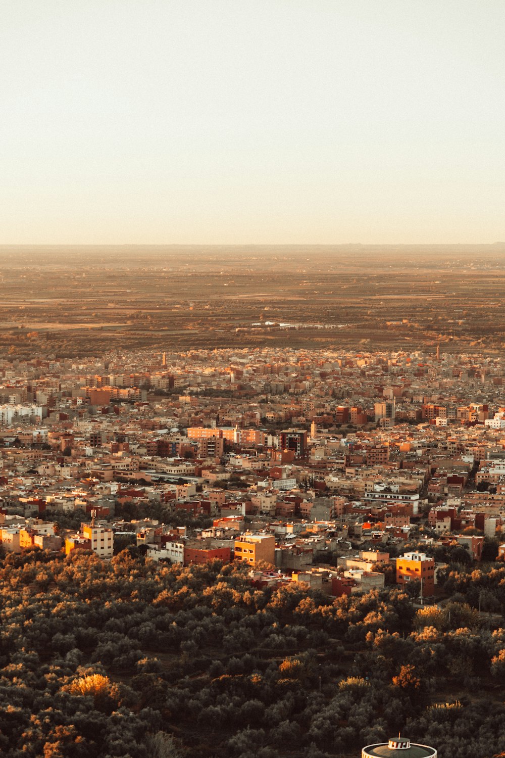 a view of a city from a hill