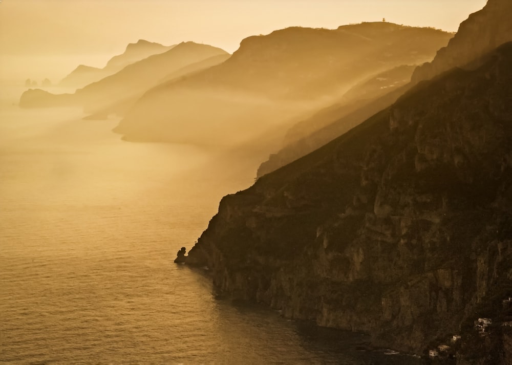 a large body of water surrounded by mountains