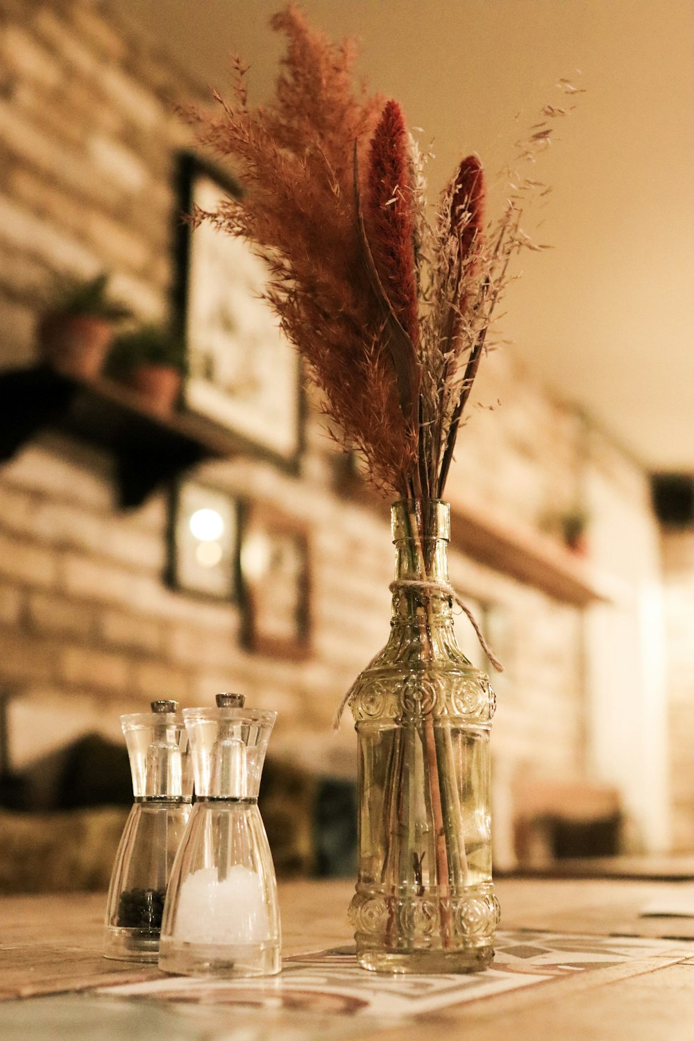 a couple of vases sitting on top of a table