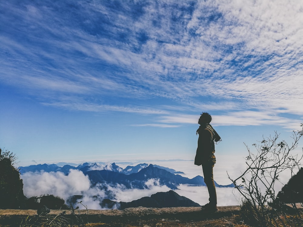 a person standing on top of a mountain