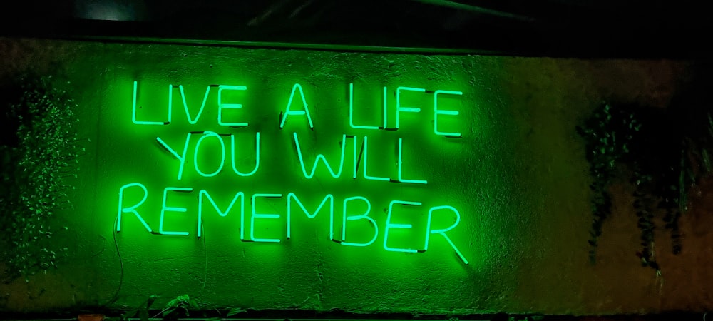 a neon sign that says live a life you will remember