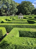 a large maze with a gazebo in the middle of it