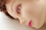 Artistic side profile of a love doll highlighting the craftsmanship of the skin texture.