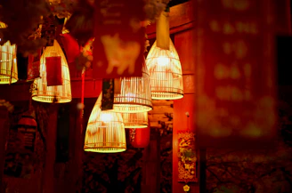 Decorative bamboo lamps glowing warmly in a cozy setting.