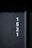 White numbers are vertically aligned on a dark gray textured wall, displaying the sequence 1, 5, 2, 1.
