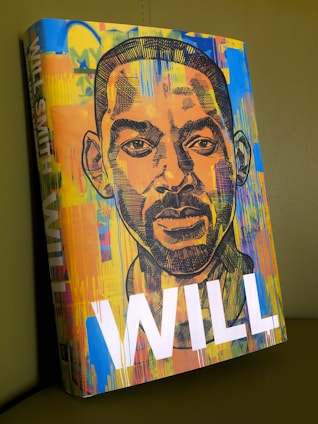 a painting of a man's face on a canvas