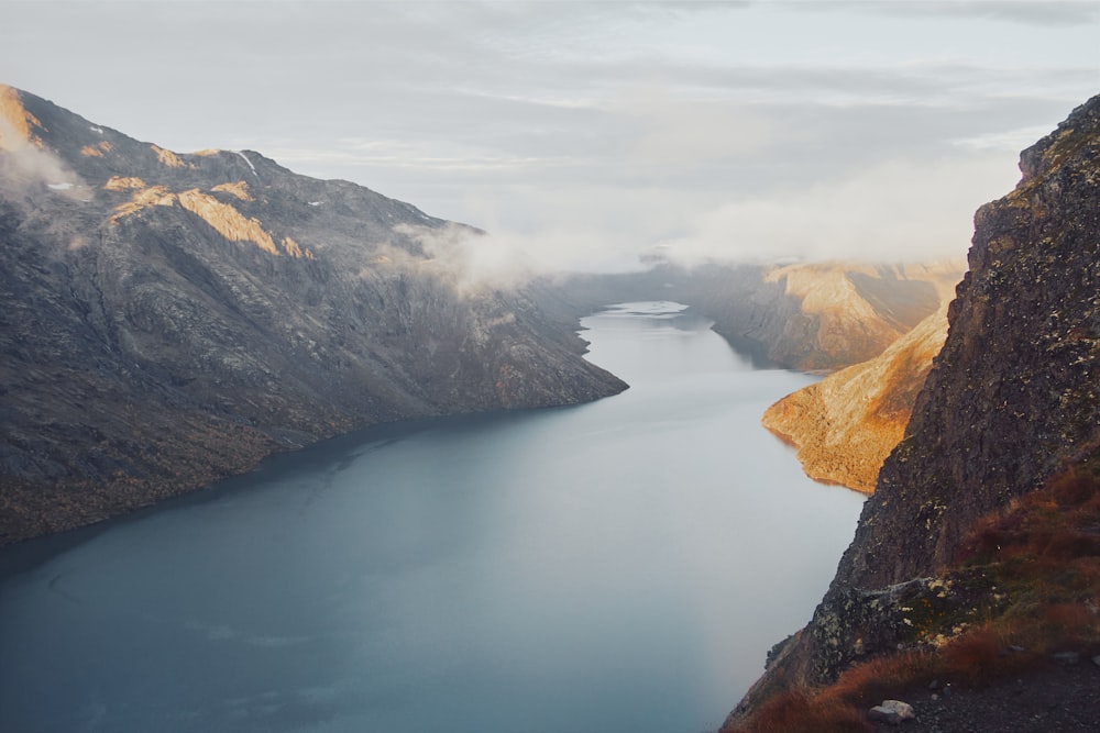 a large body of water surrounded by mountains