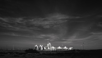Night shot of our team working on silo storage maintenance with bright floodlights.