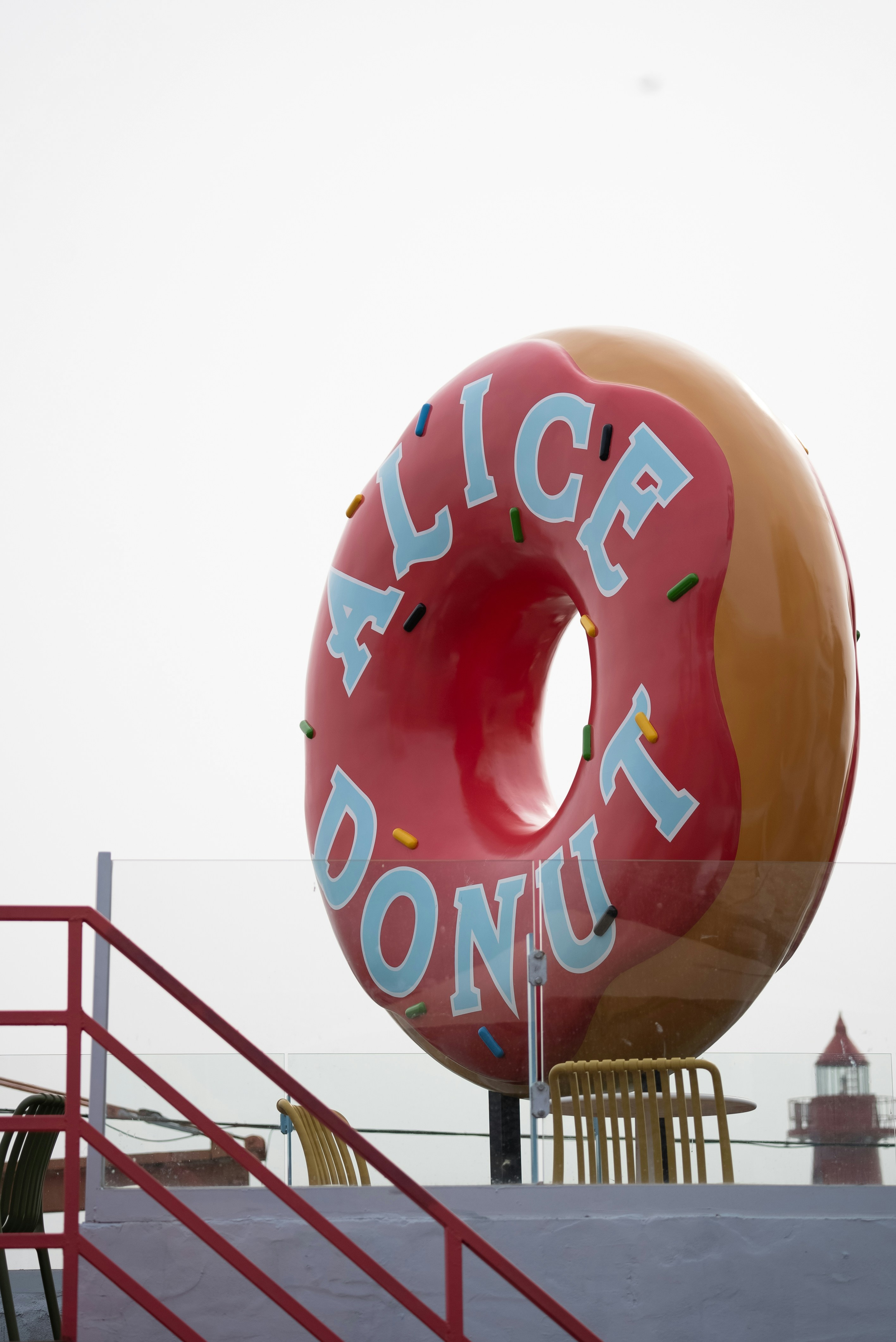 a giant donut sitting on top of a playground