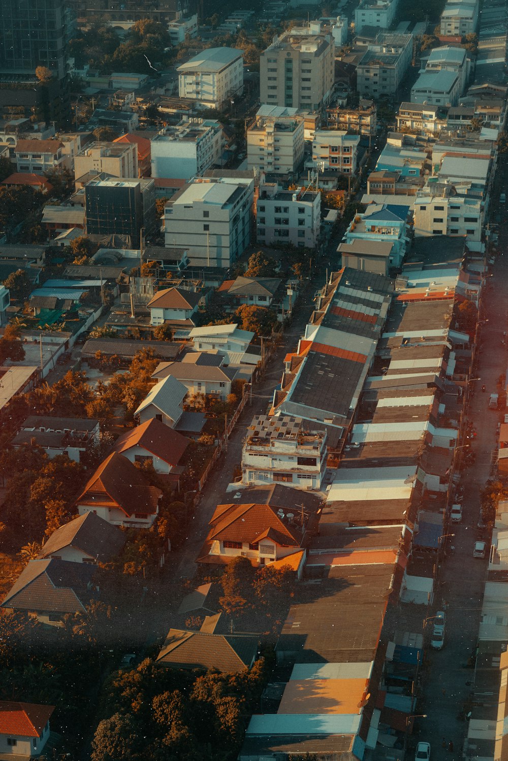 an aerial view of a city with lots of buildings