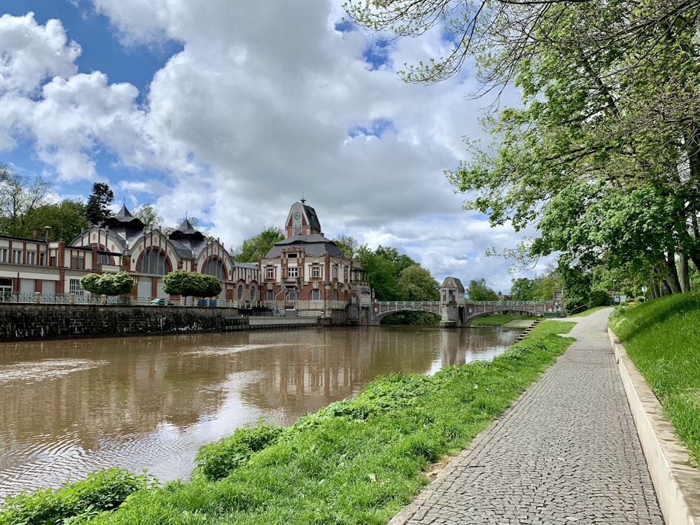 a river running through a lush green park