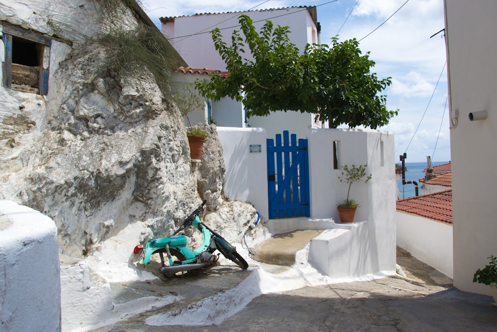 a bike is parked on a cobblestone street