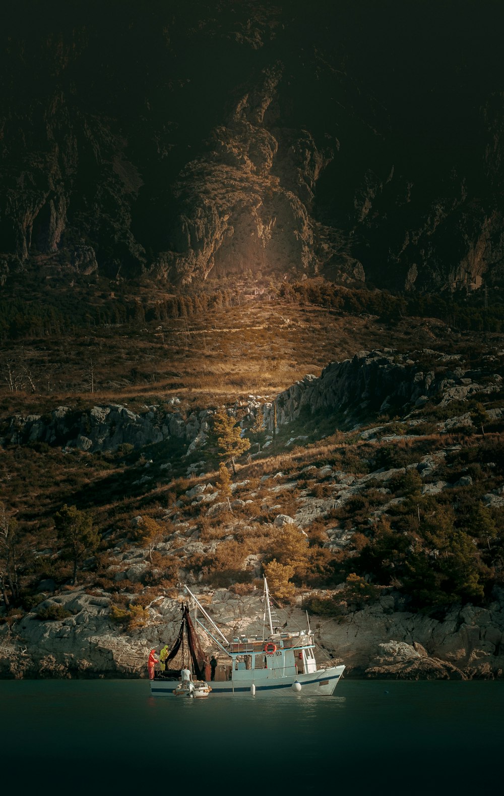 a boat floating on top of a body of water