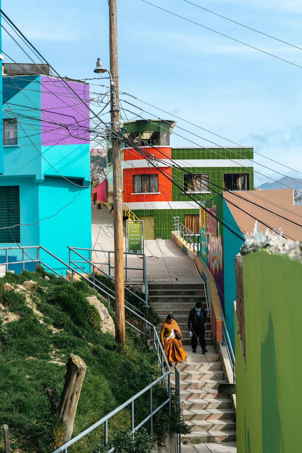 a group of people walking up a flight of stairs