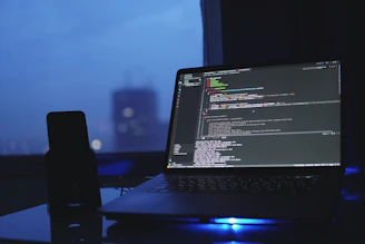 a laptop computer sitting on top of a desk