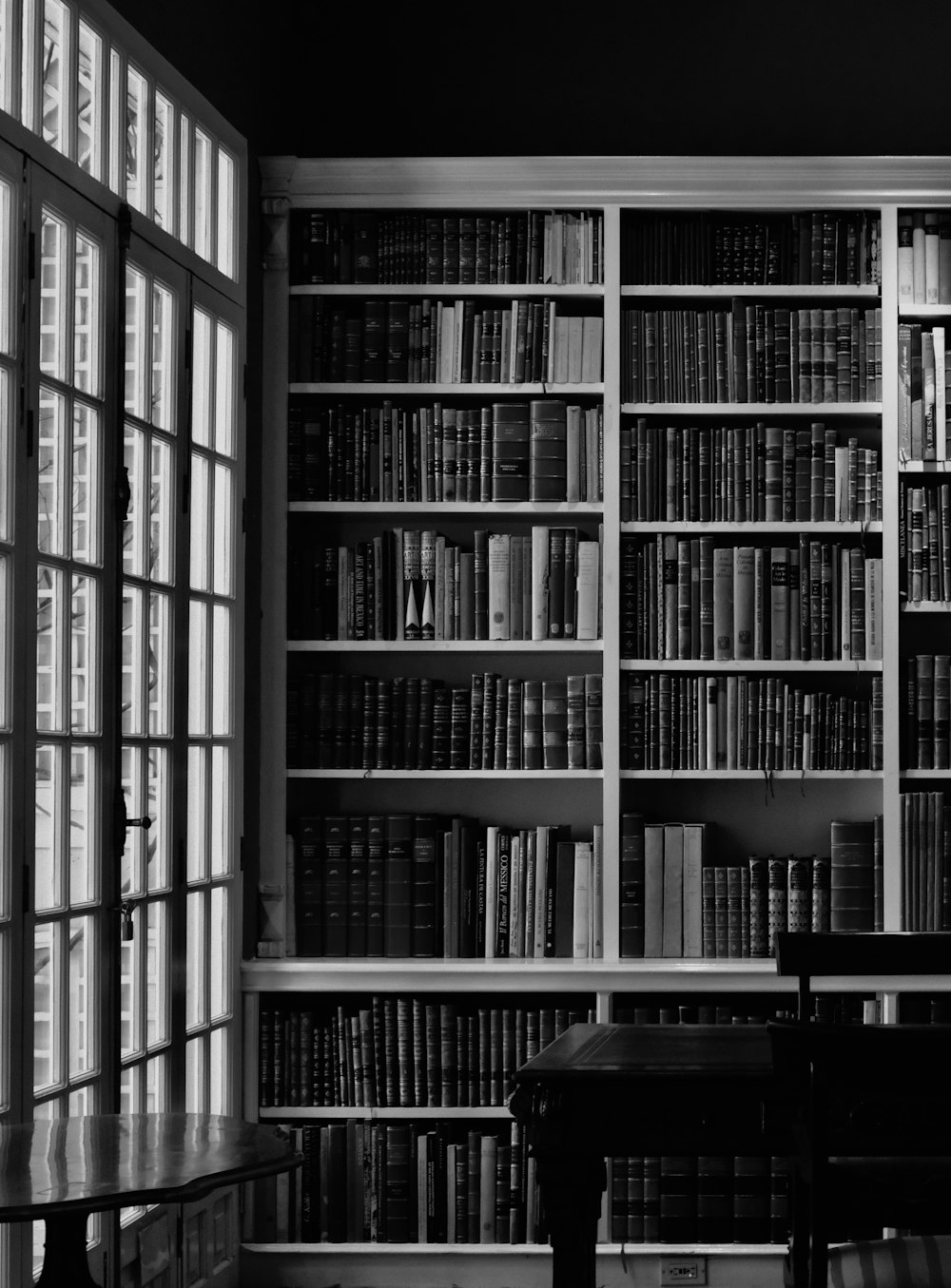 a large book shelf filled with lots of books