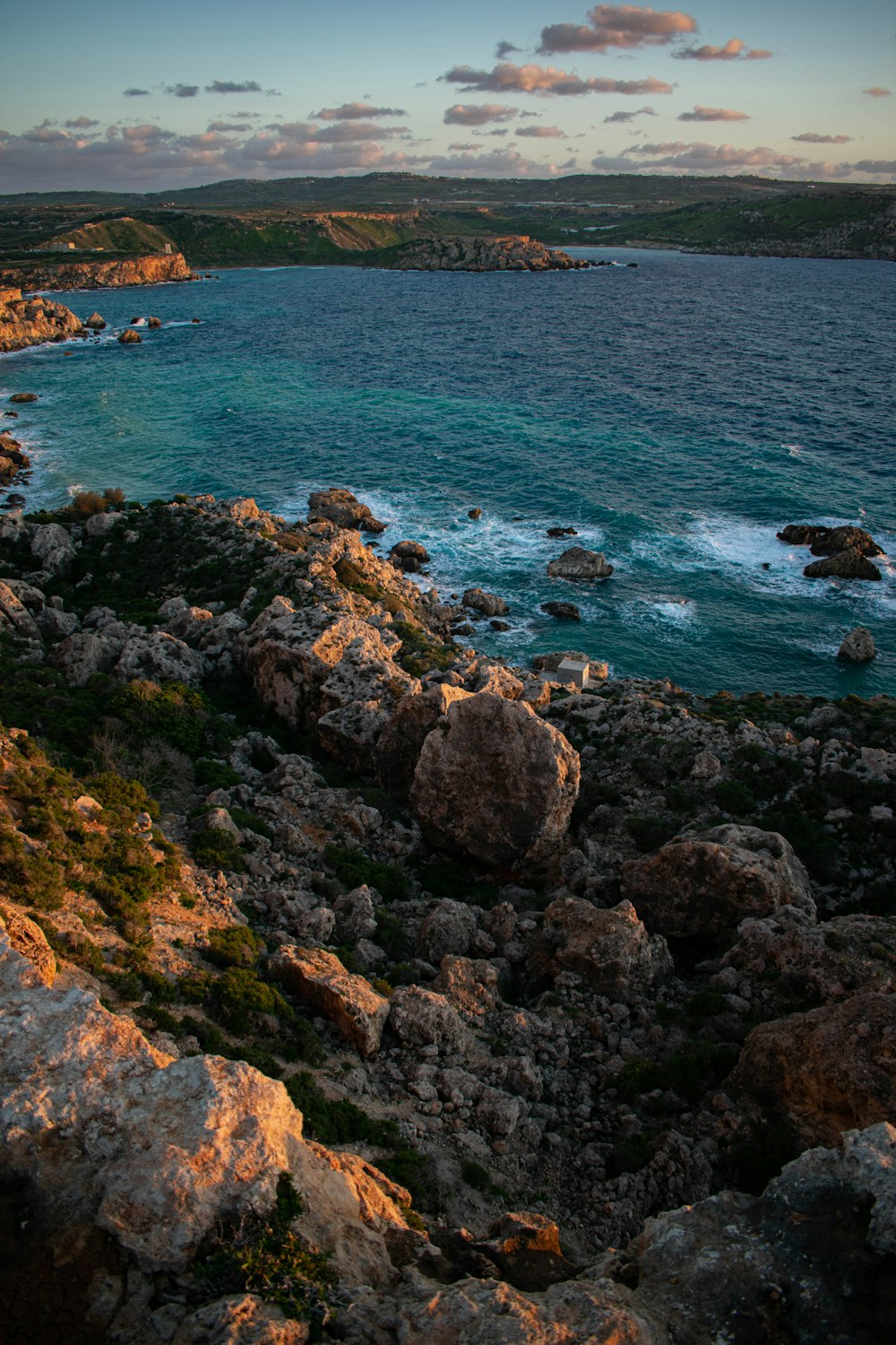 a large body of water surrounded by rocks