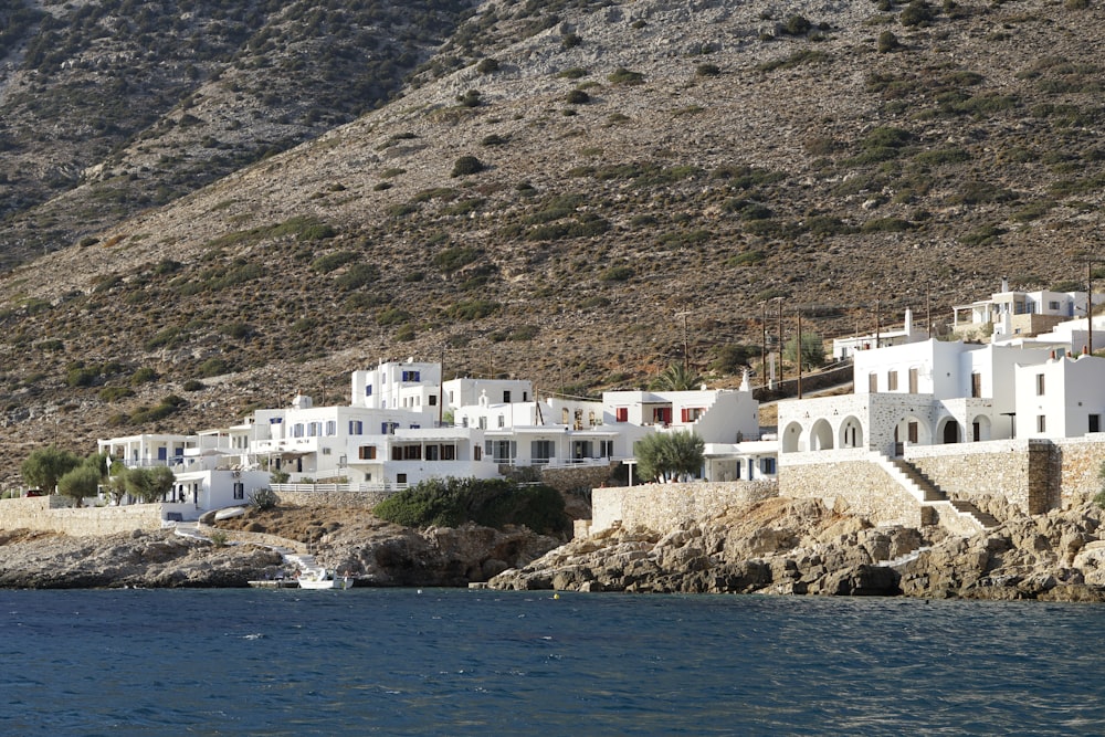 a white village on the side of a mountain