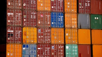 a large stack of containers stacked on top of each other