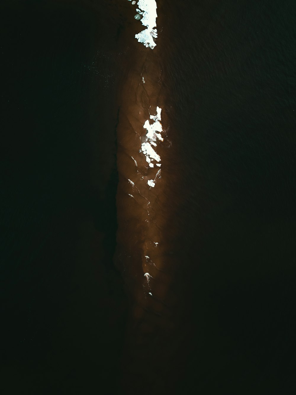 an aerial view of a body of water