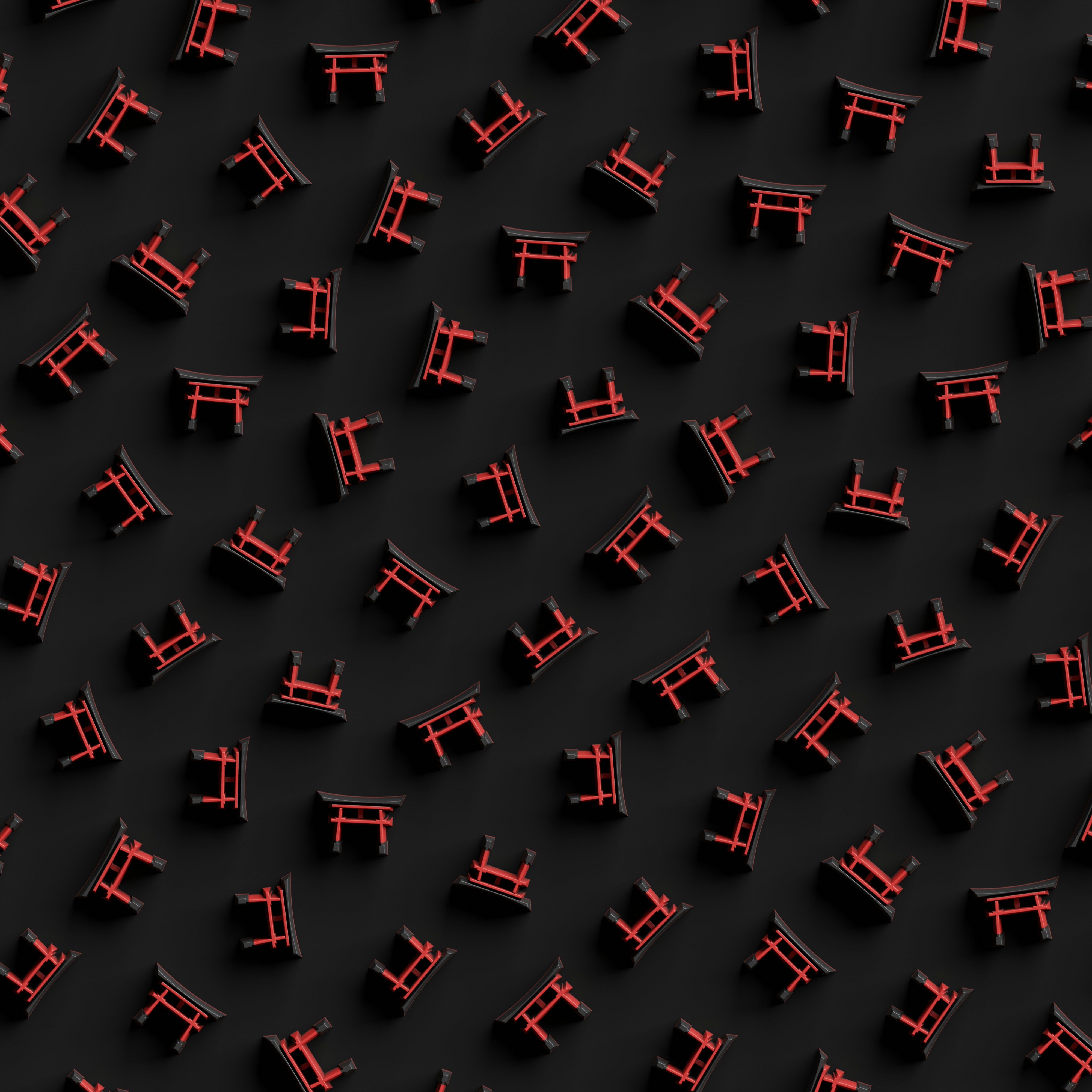 a group of red chairs sitting on top of a black surface
