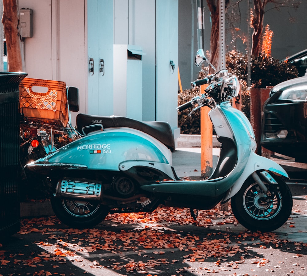 a scooter parked on the side of the road