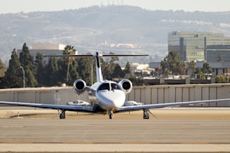 a small airplane is sitting on the runway