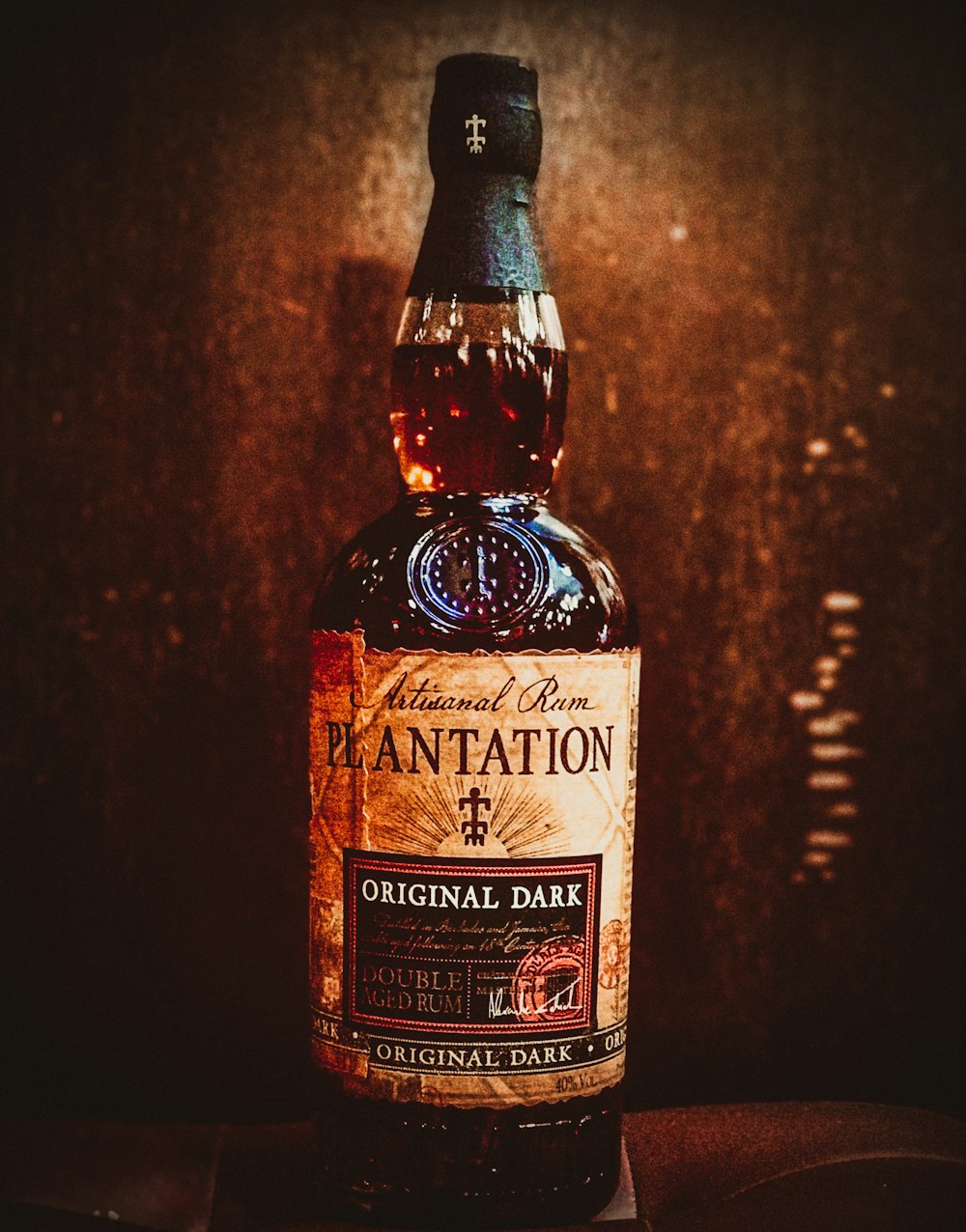 a bottle of plantation dark sitting on a table