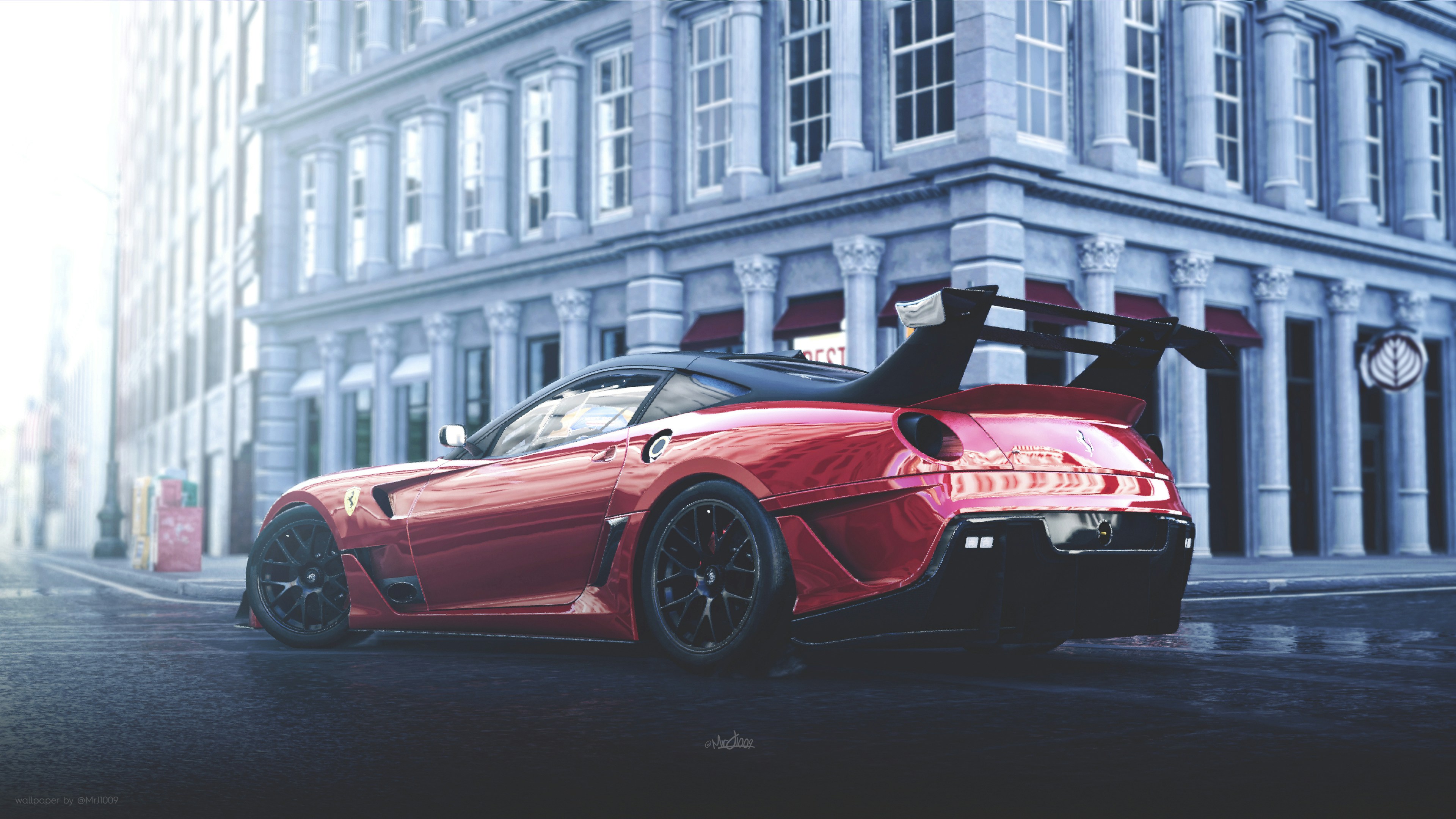 a red sports car parked in front of a tall building