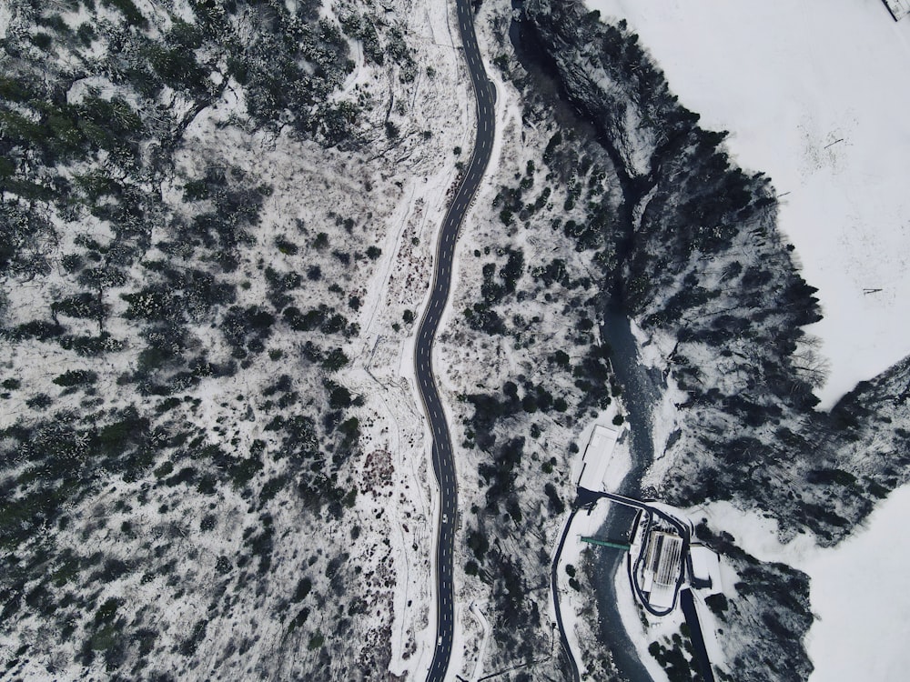 an aerial view of a snow covered area