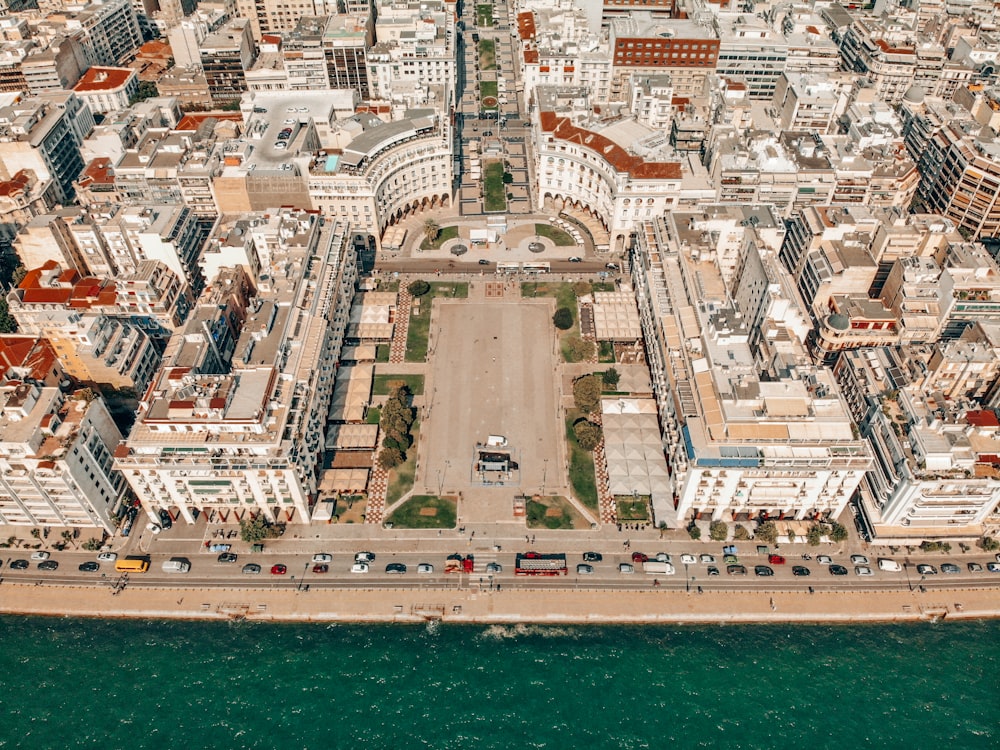 an aerial view of a city with lots of tall buildings