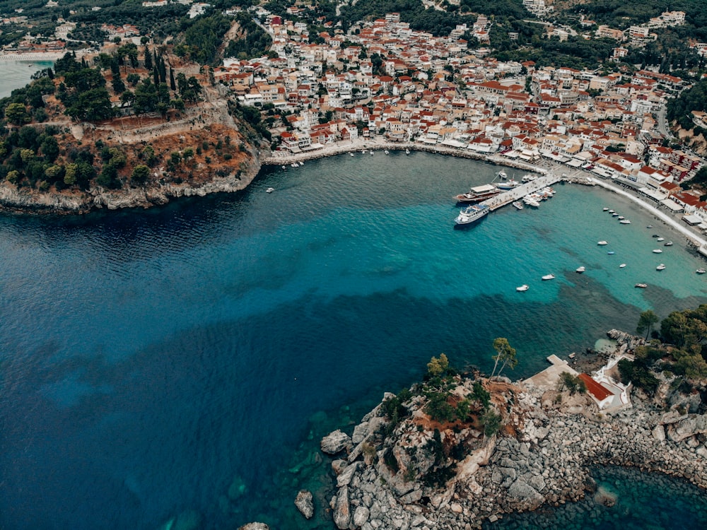 a large body of water surrounded by a small town