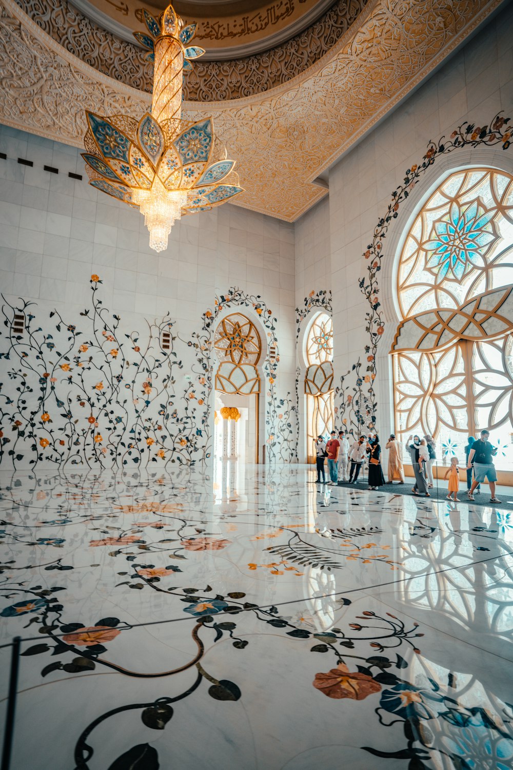 a large room with a chandelier hanging from the ceiling